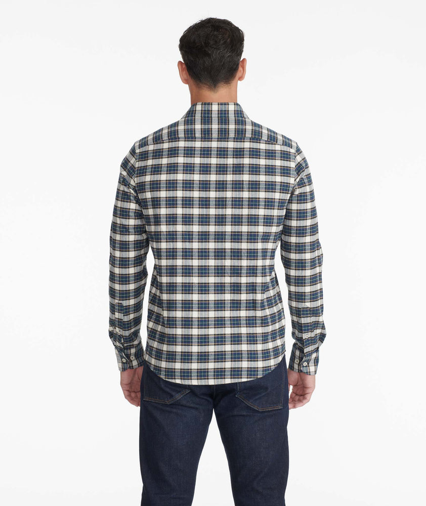 Model wearing a Green Flannel Rogan Shirt