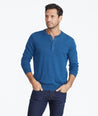 Model wearing a Mid Blue Henley Sweater
